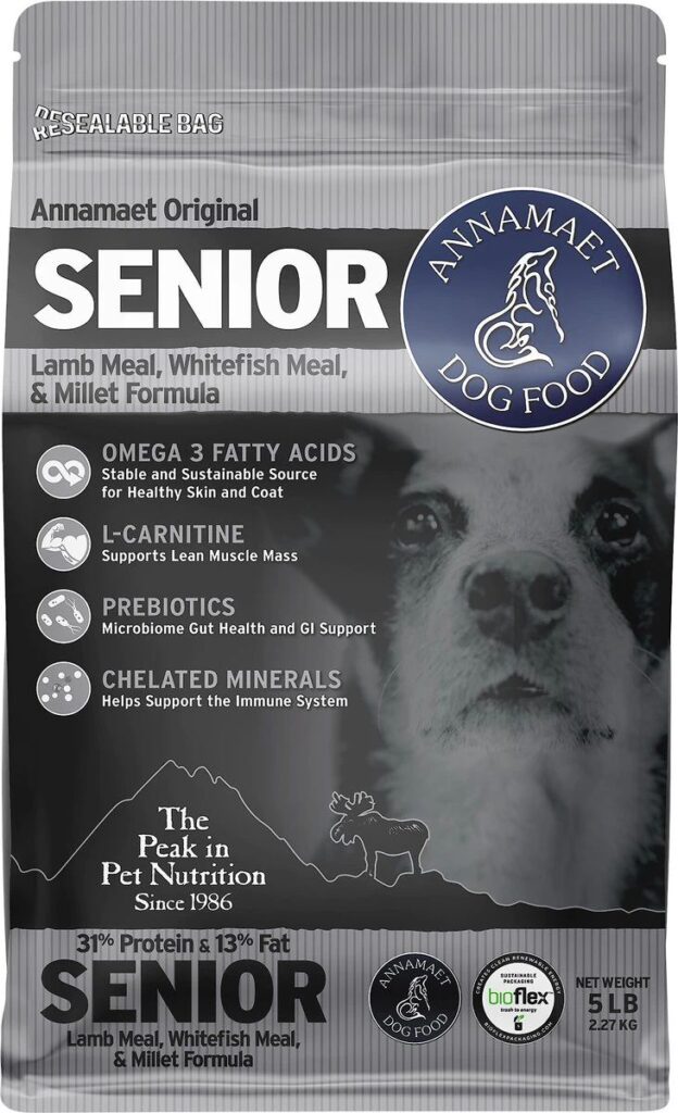 Gray Annamaet Senior dog food bag shows a dog's face plus omega 3, L-carnitine, and chelated minerals benefits.