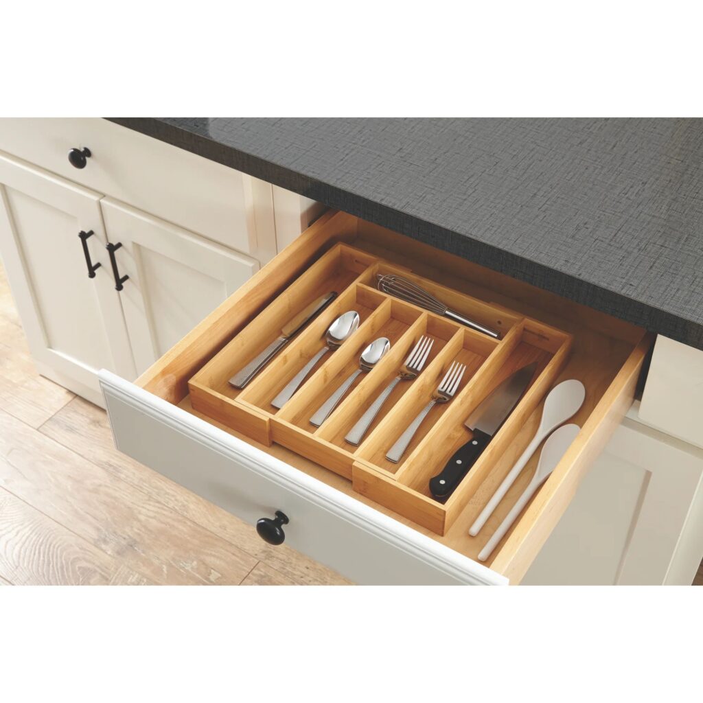Organize small kitchen essentials with this wooden drawer organizer for utensils, knives, forks, spoons, and tools.