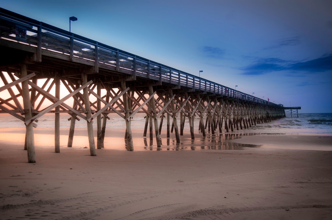 Sunrise over the ocean and pier in Myrtle Beach, South Carolina