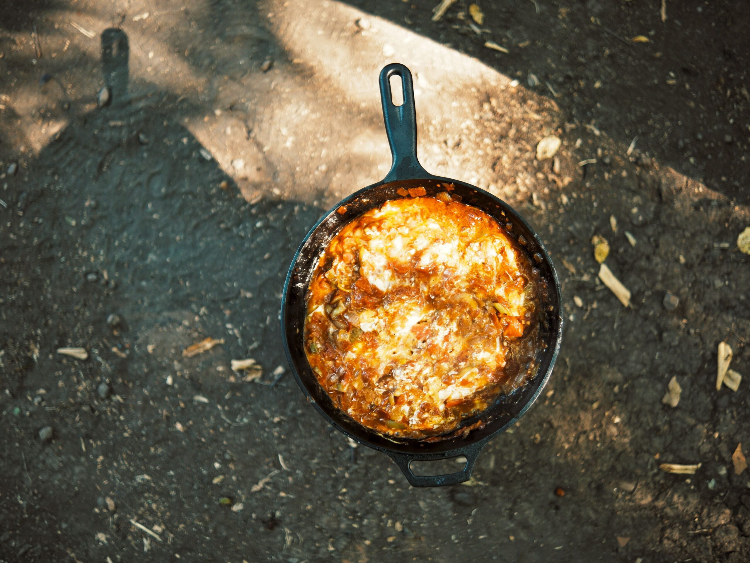 Stew simmering in a cast iron skillet