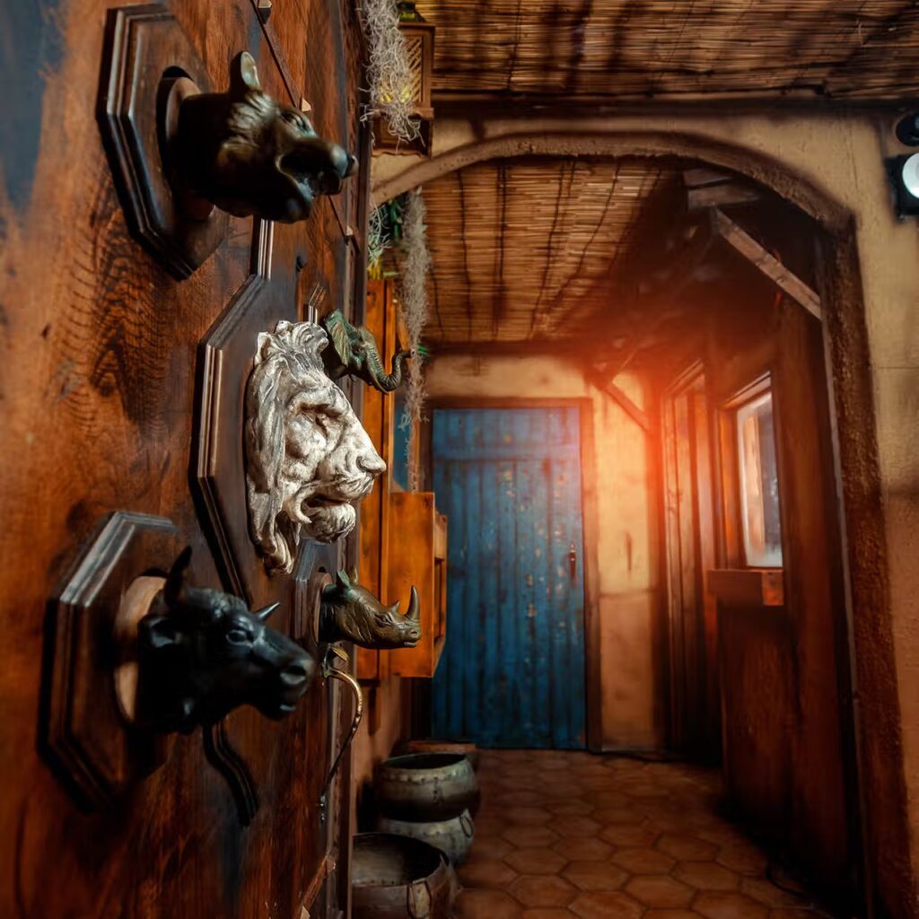 Animal head wall mounts and a blue door add charm, echoing the cozy flair of things to do in Myrtle Beach.